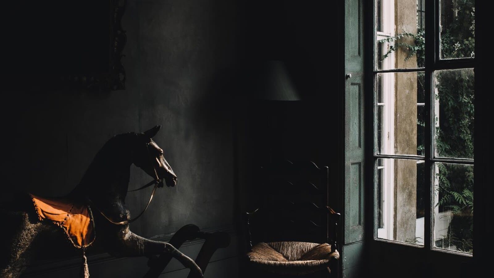 Old living room at night with deep shadows after a scary movie